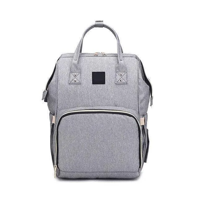Chic Canvas Diaper Backpack: Trendy Mommy Bag with Smart Storage Solutions